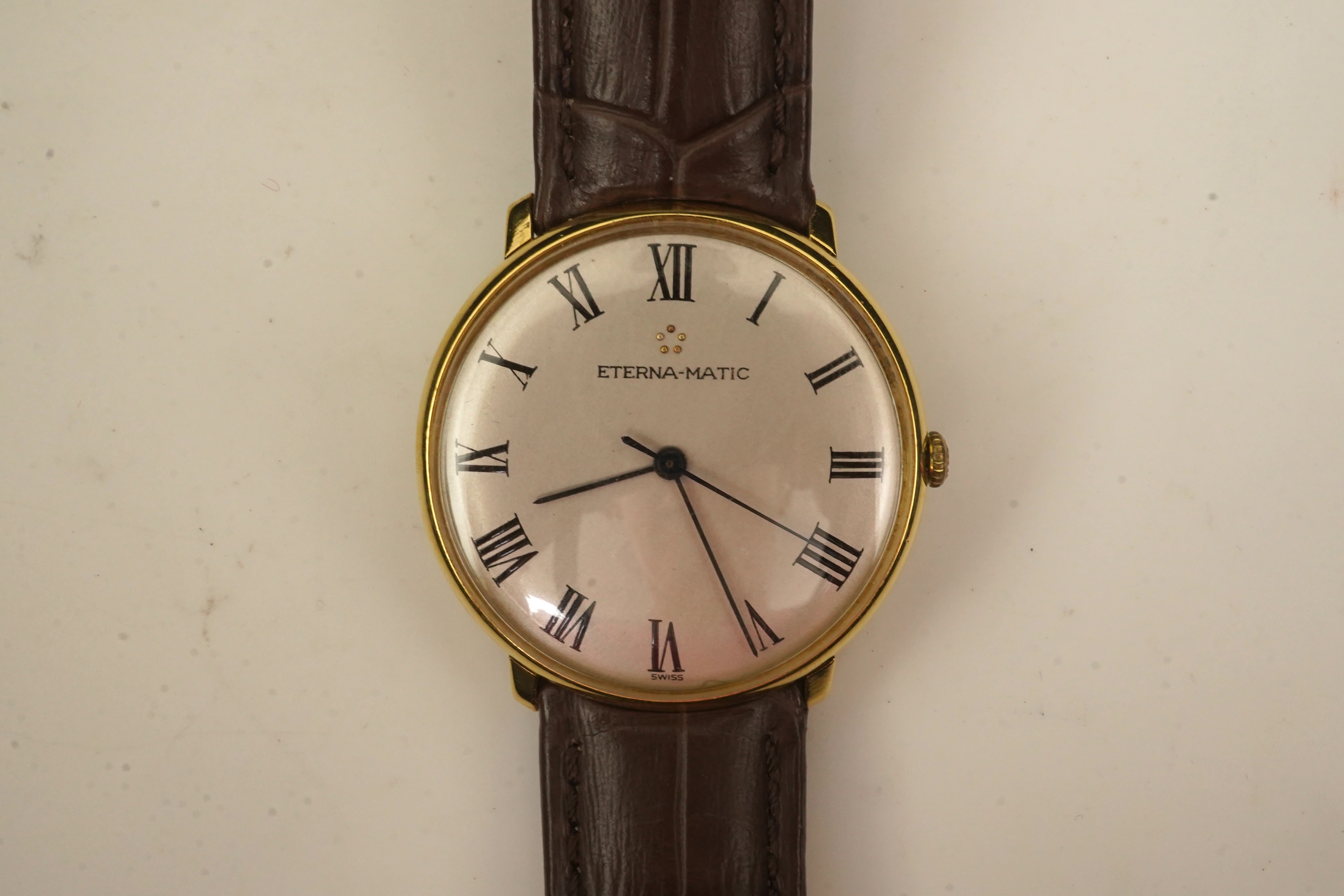 A gentleman's 18ct gold Eterna-Matic manual wind dress wrist watch, on a later associated Hirsch leather strap